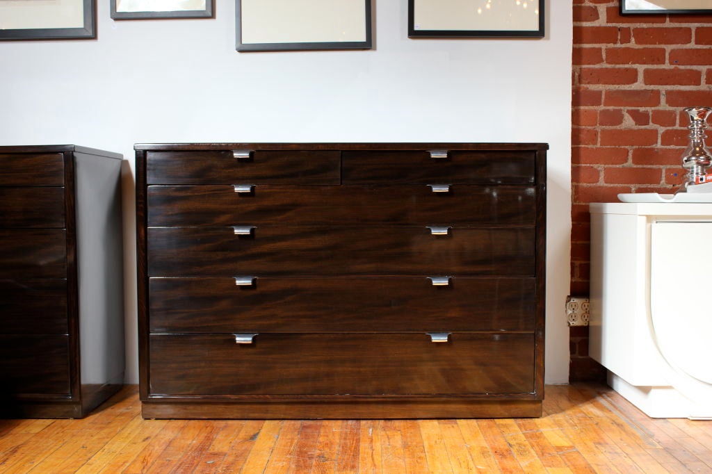 Pair of Edward Wormley 6 drawer dressers from the Precedent Collection for Drexel @ 1948.  The dressers are finished in a deep chocolate with exceptional grain.  These are very generous in scale and have lots of storage.  The top has 2 drawers with