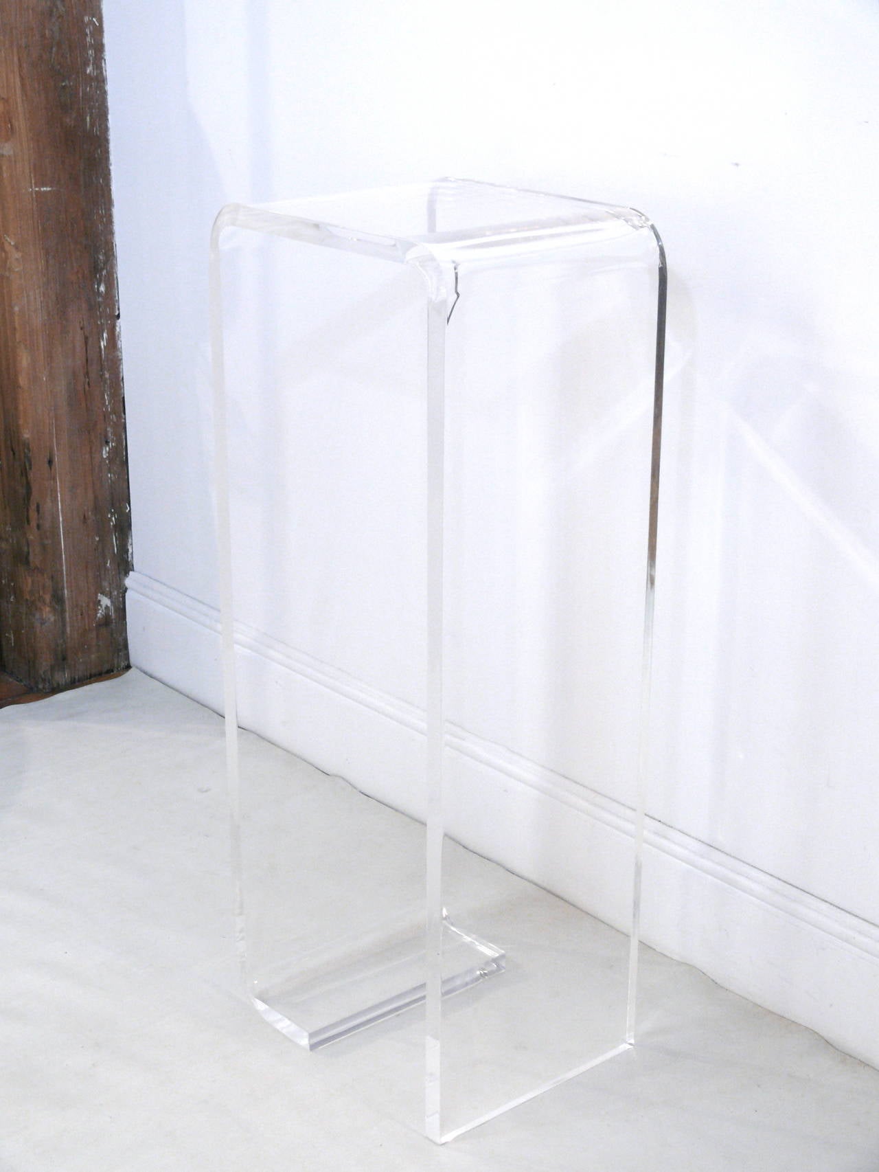 Beautiful full lucite waterfall Mid-Century pedestal.  Newly polished and in fantastic condition.