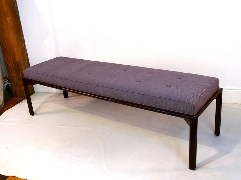 Superb bench by Edward Wormley for Dunbar with Dunbar burned in signature and gold tag. Newly refinished in a deep walnut with new upholstery. COM also available.