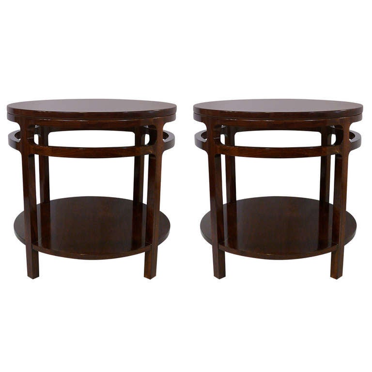 Pair of sculpted walnut side tables.