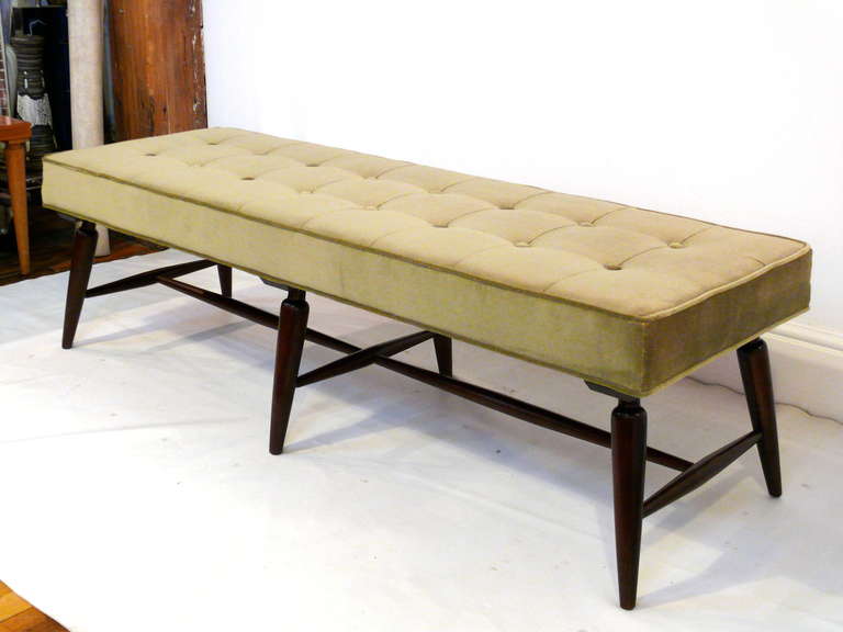 Flared six leg ebonzied mid century bench with newly upholstered tufted green velvet top.