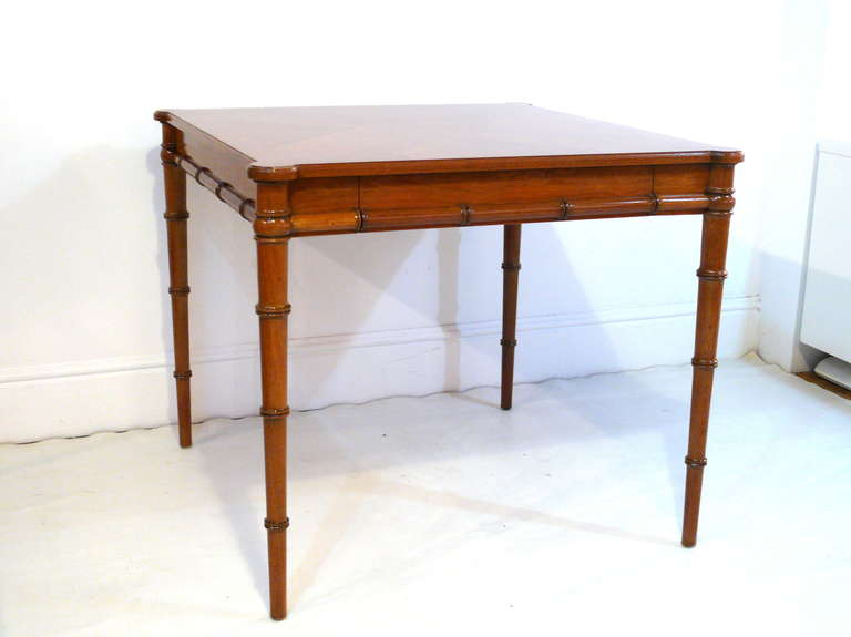 Extraordinary Mid-Century faux bamboo game table with rounded corners and bookmatched top made for John Stuart.   Single drawer for essentials.