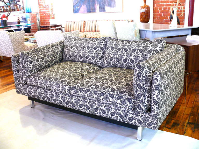 Stunning setee/loveseat in the manner of Milo Baughman with chrome legs.  Cushions are down filled and extremely comfortable.