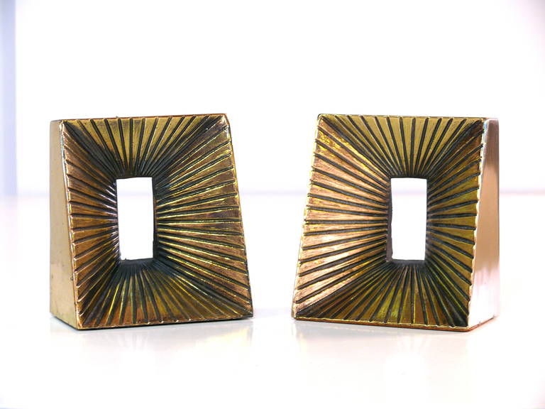 Pair of gold toned ceramic bookends in the manner of Ben Seibel in great vintage condition.