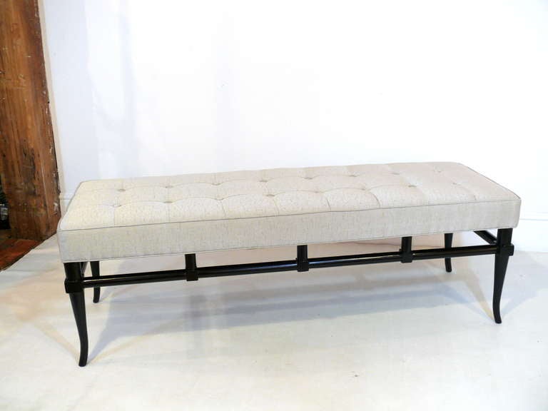 Saber leg bench with upholstered tufted top by TH Robsjohn Gibbings. Newly refinished in dark espresso.