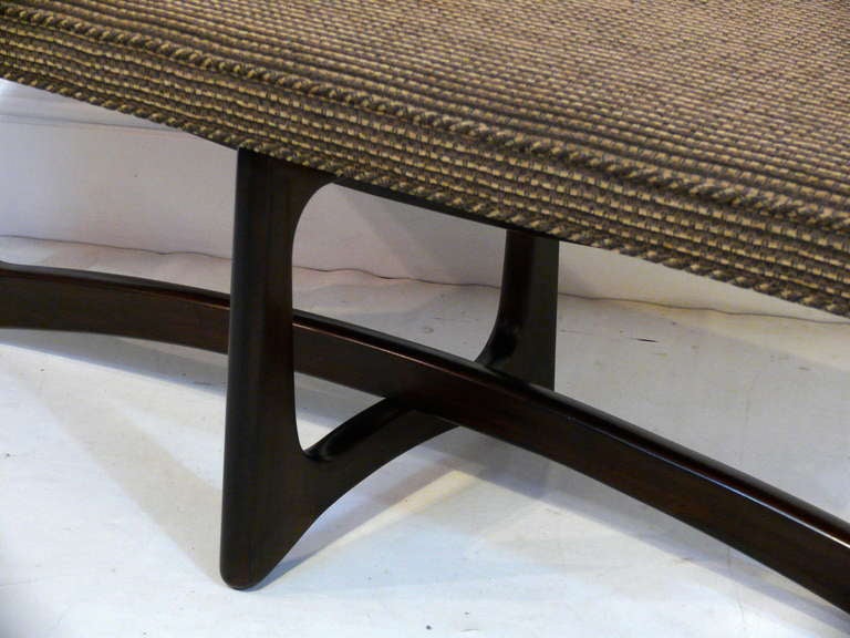Bench by Adrian Pearsall for Craft, 1960's.  Walnut base is newly refinished in a deep chocolate with a medium sheen.  Top is a neutral chenille, newly upholstered.