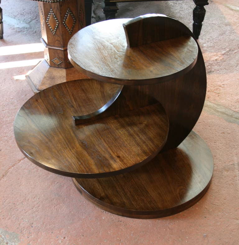 French Art Deco style solid walnut side table comprised of three-tiered circles set into a cut out circle base.