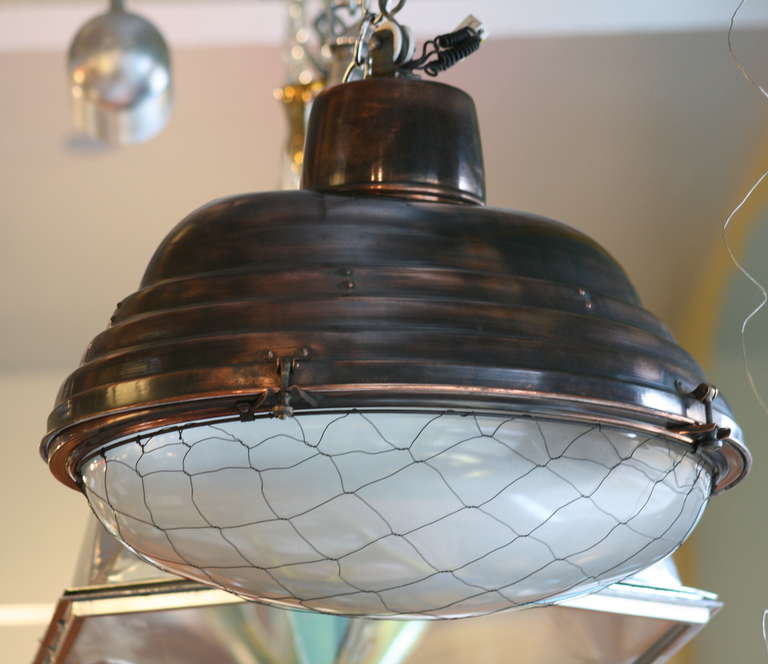 French copper oval pendant lights with original glass and metal mesh. Can be fitted with chain or pole.
Three available.