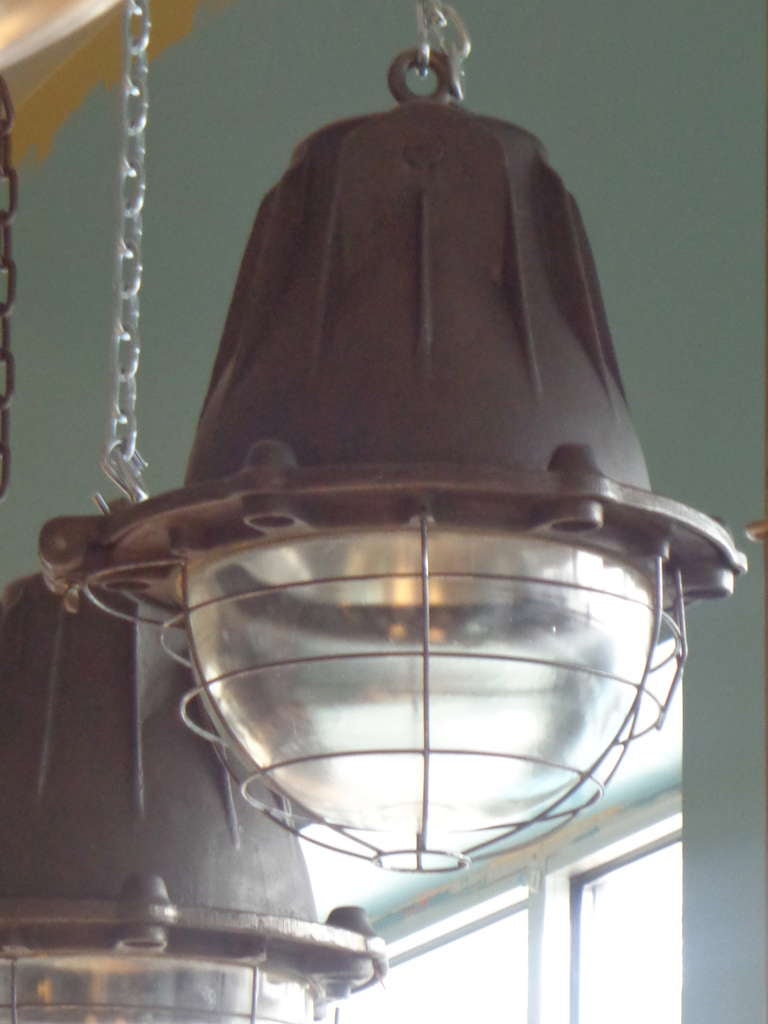 Pair of Impressive Cast Iron French Factory Lights with Original Glass In Good Condition In Pound Ridge, NY