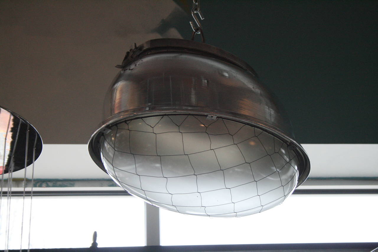 Mid-20th Century Large Oval Pendant Lights in Polished Aluminum and Original Glass