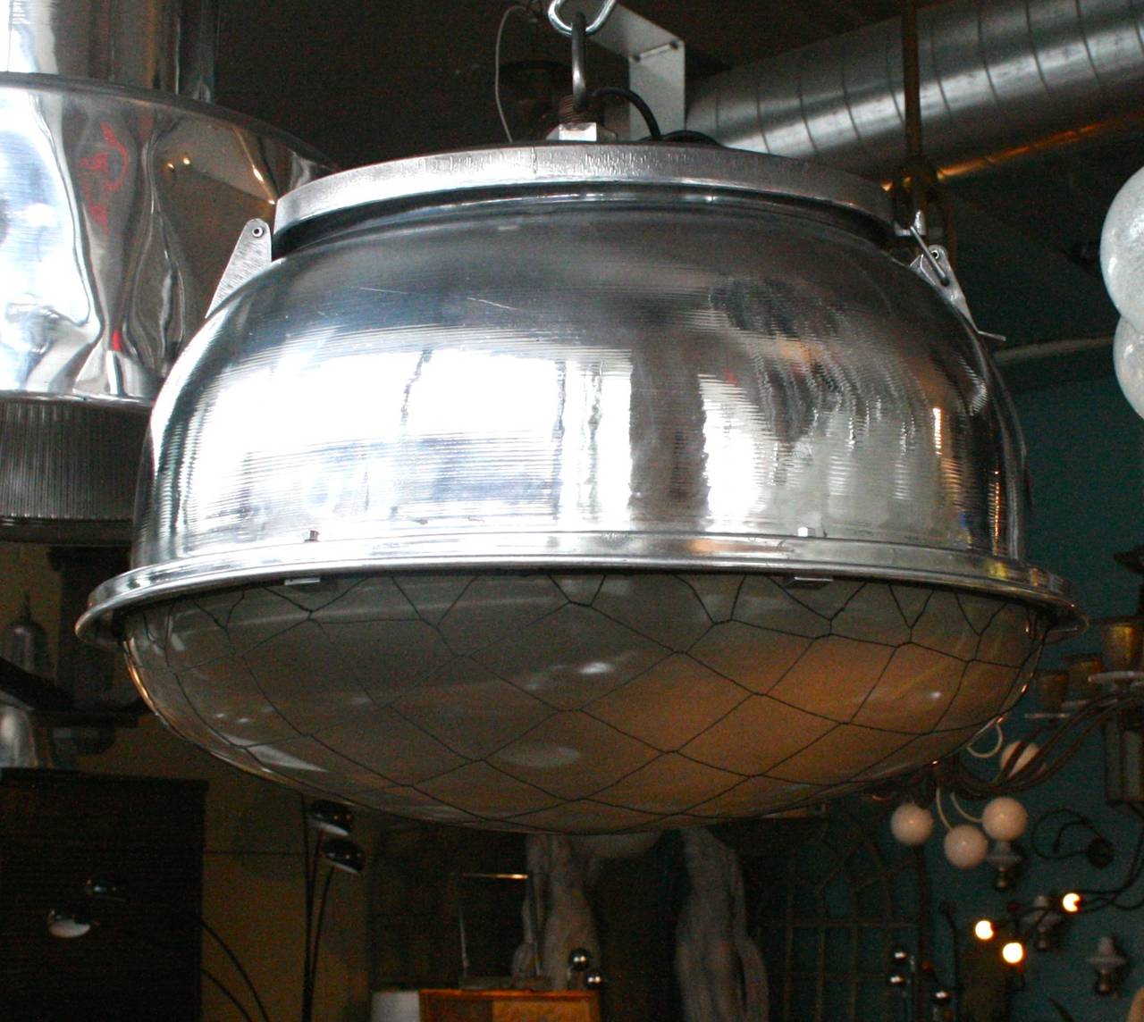 French Large Oval Pendant Lights in Polished Aluminum and Original Glass