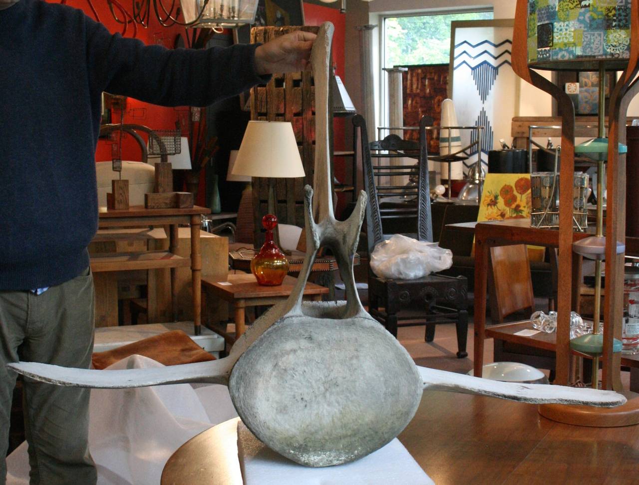 Impressive fossilized whale vertebra with incredible age and beauty. Sun bleached surface has the appearance of driftwood. Steel stand currently being fabricated.