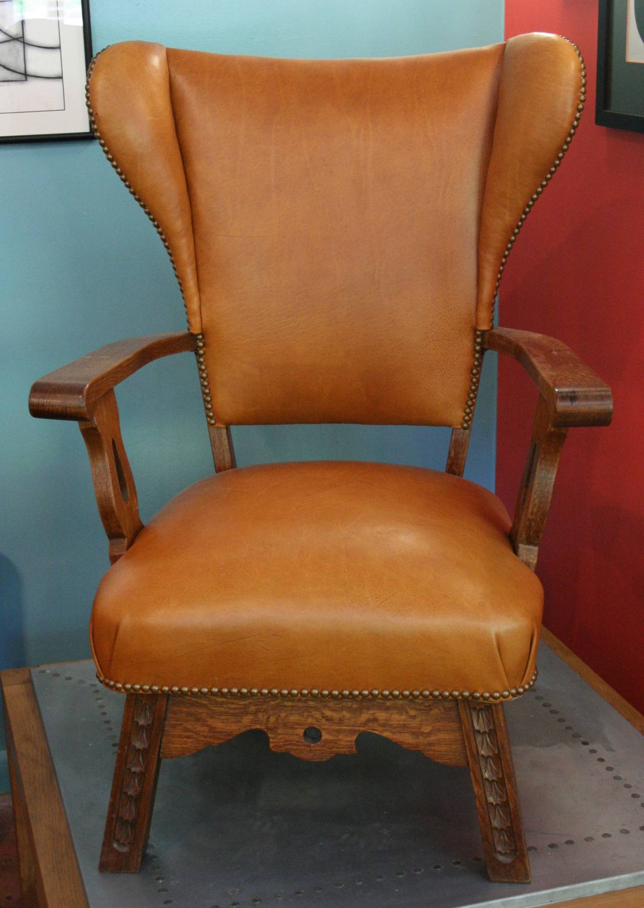 Arts and Crafts Oak and caramel leather wing chair