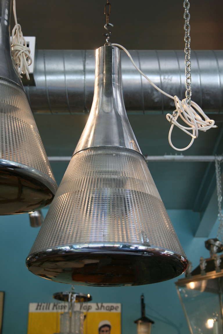 Pair of unusual large pendant lights, polished aluminum pendant lights with molded perspex section and chrome bottom plate