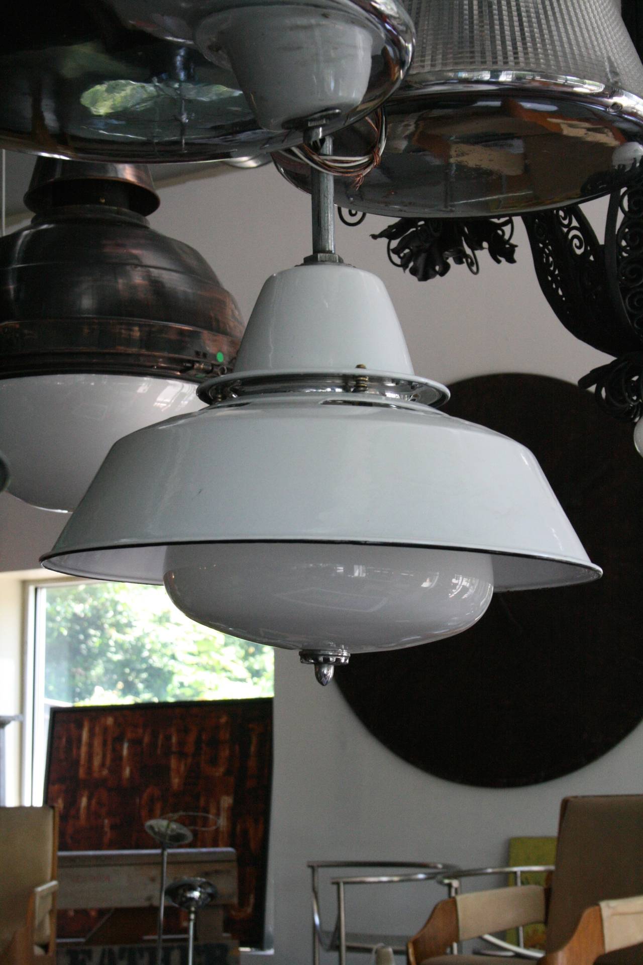 Charming enameled pendant lights with milk glass shades and nickel finial. 2 pieces available.