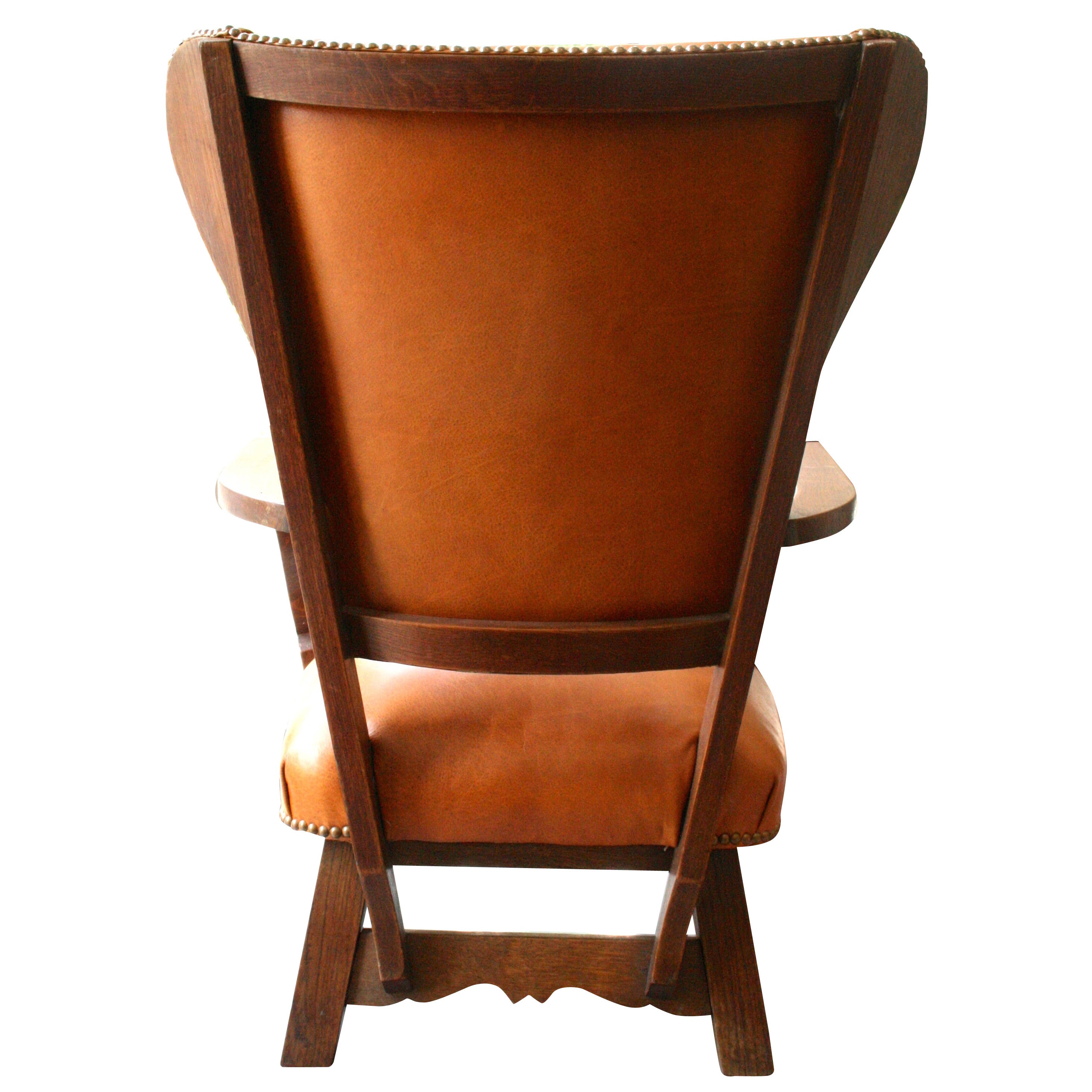 Oak and caramel leather wing chair