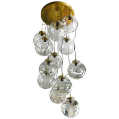 Large French Brass Cascading Chandelier with Glass Globes
