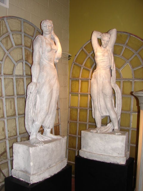 Evocative American Art Deco period plaster sculptures of maidens, nearly lifesize.