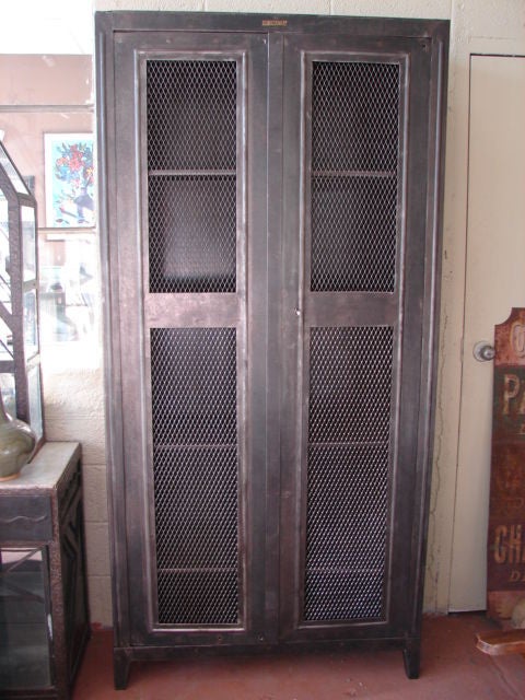 French Steel armoire cabinet with mesh panel doors