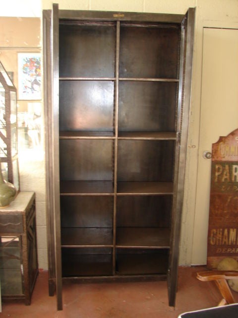Mid-20th Century Steel armoire cabinet with mesh panel doors