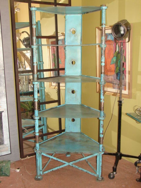 Large-scale French blue painted Industrial steel etagere, for a corner or freestanding.