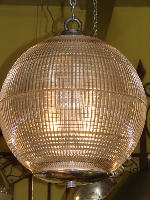 Large scale glass ball light, steel and brass fittings.