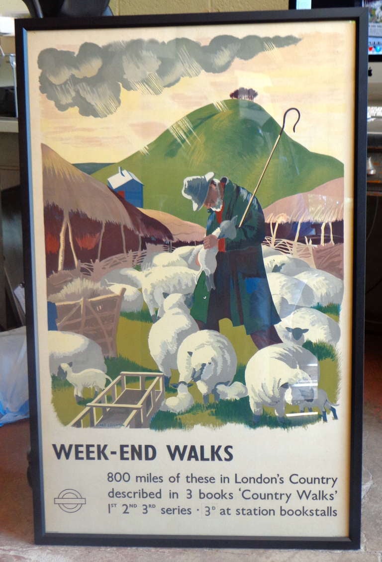 Original poster, Week-end Walks, by Clare Leighton, 1938, Published by London Transport, Printed by The Baynard Press.
Produced just before W.W.II, Clare Leighton's gentle rendering of a farmer cradling a young lamb
under a foreboding sky