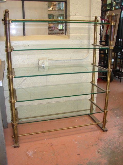 Solid brass shelving unit with aged original finish, new glass, from a french patisserie.