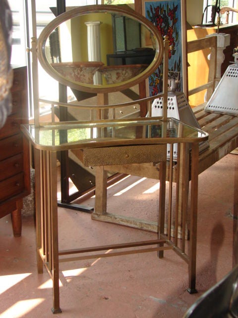 Mirrored brass dressing table