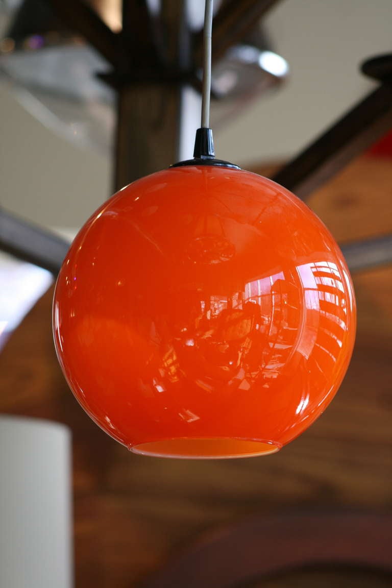 Set of Italian orange glass sphere lights, circa 1970s,
Two available.