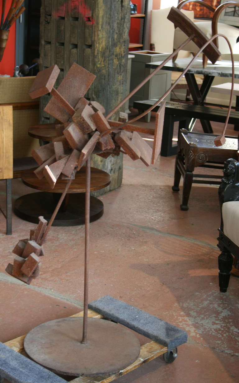 Mid century weathered steel and iron atomic age sculpture. In the style of Bertoia. Can be used indoor or outdoor.