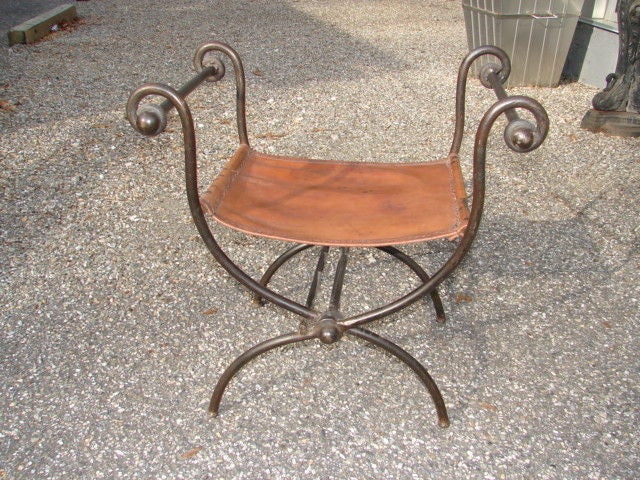 Solid iron folding throne bench with original leather and hand stitching