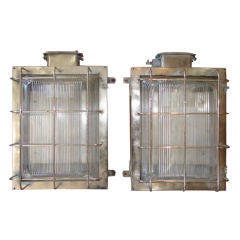 Pair of steel and holophane wall lights