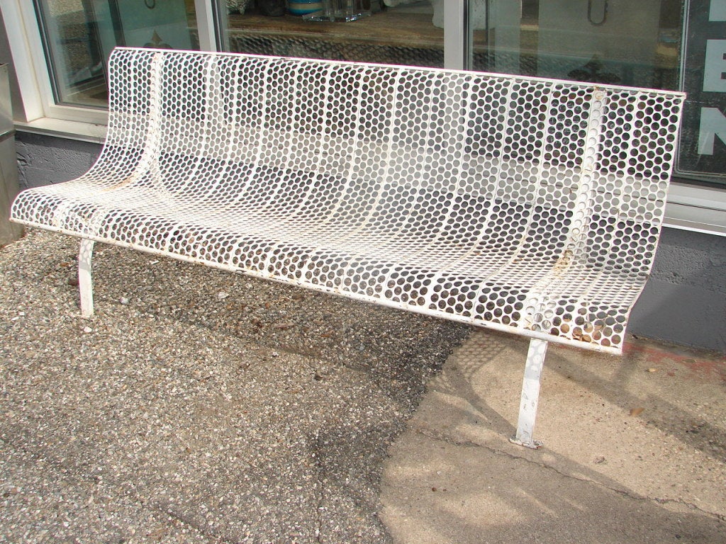 Painted steel bench made from pierced metal sheets. Two available, not identical. each bench list $2500