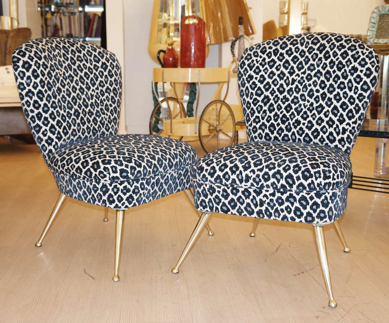 Striking pair of Italian 1950s - Early 1960s, diminutive slipper chairs. Re-upholstered in a great leopard spots fabric. Pointed brass legs. Perfect for a bedroom as undressing chairs or as additional chairs for a living room.