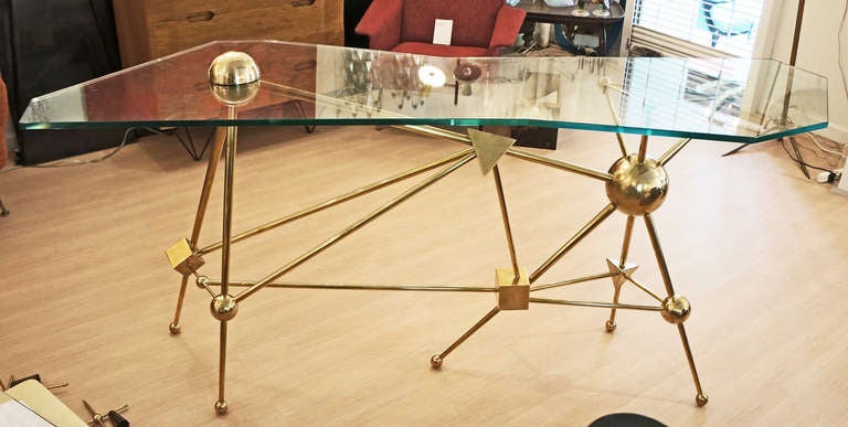 This console is composed of an irregular group of geometric shapes connected by brass bars. The glass top is also an irregular shape. Only six of these consoles will be made for Gaspare Asaro by Italian artist Fedele Papagni. Signed and marked 1/6.