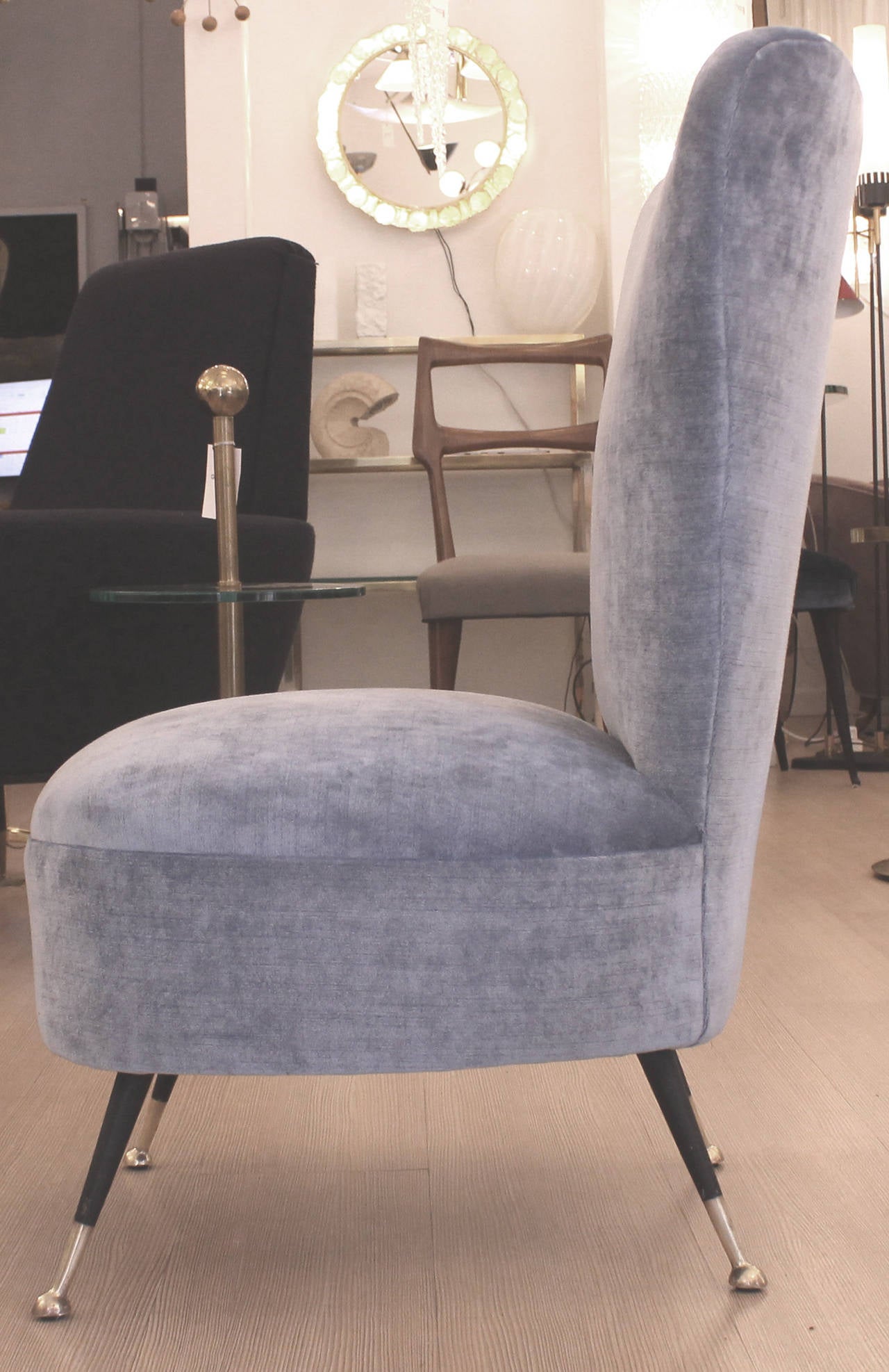 Elegant pair of Italian, 1960s, diminutive slipper chairs. Low seat resting on brass tip legs and regular height back. Perfect for a bedroom as undressing chairs or as additional chairs for a living room. One has been upholstered with the fabric