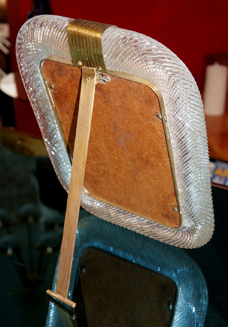 A large classic Barovier & Toso picture frame made of twisted hand blown glass and brass. These frames were created between the 40's and the early 60's.  This one doesn't have markings but is identical to other branded Barovier & Toso frames.