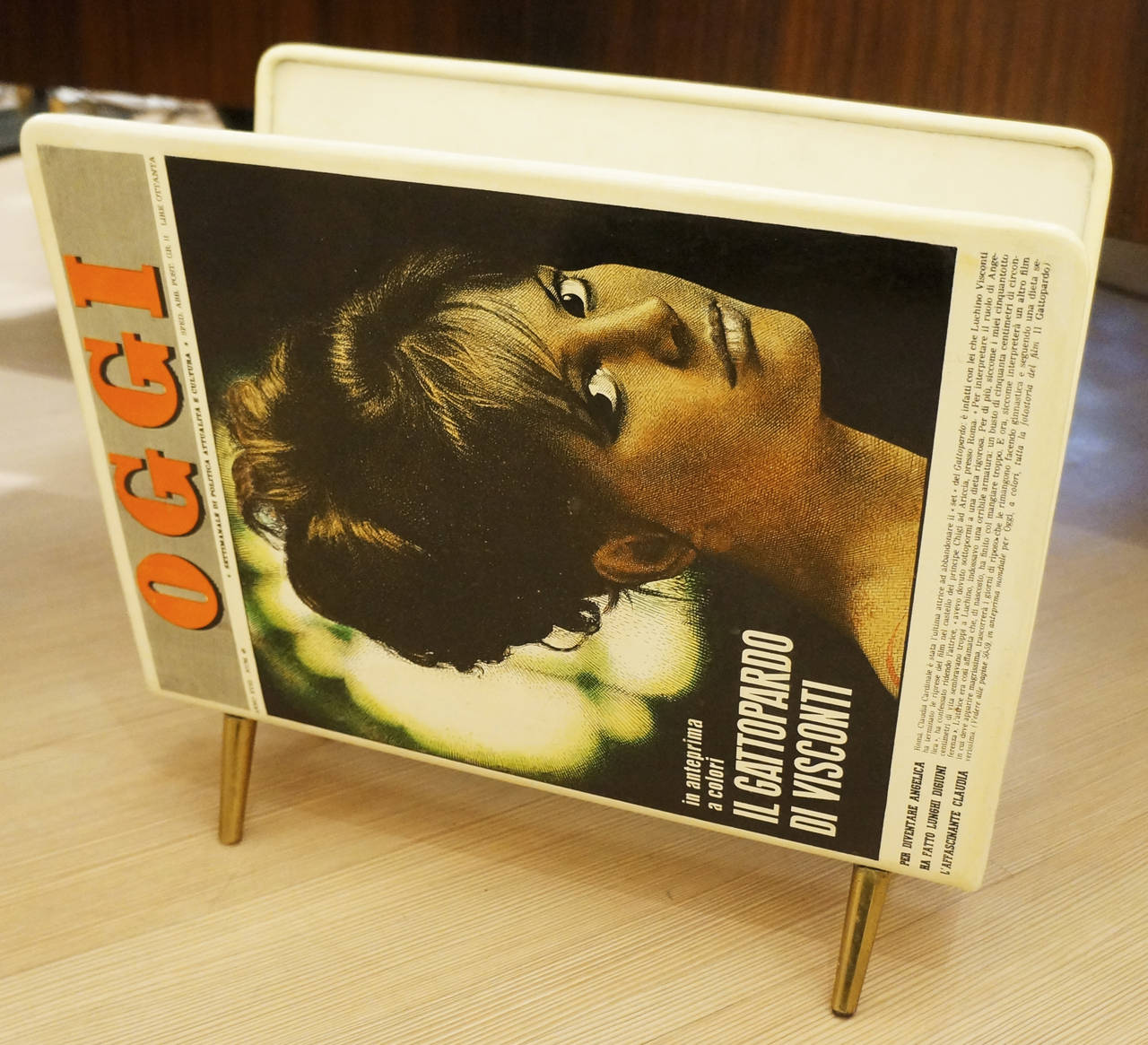 1960s magazine Stand by Piero Fornasetti with images of Italian magazines of the time, in particular an image of Claudia Cardinale the beautiful actress of the Visconti's film 