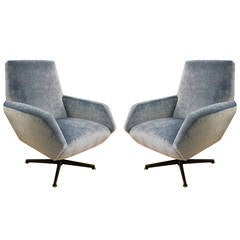 Italian mid-century swivel lounge chairs
