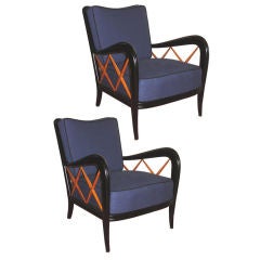 A most elegant pair of Italian armchairs