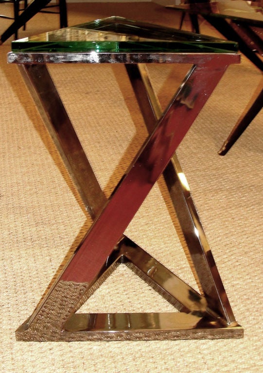 Small triangular chrome side table