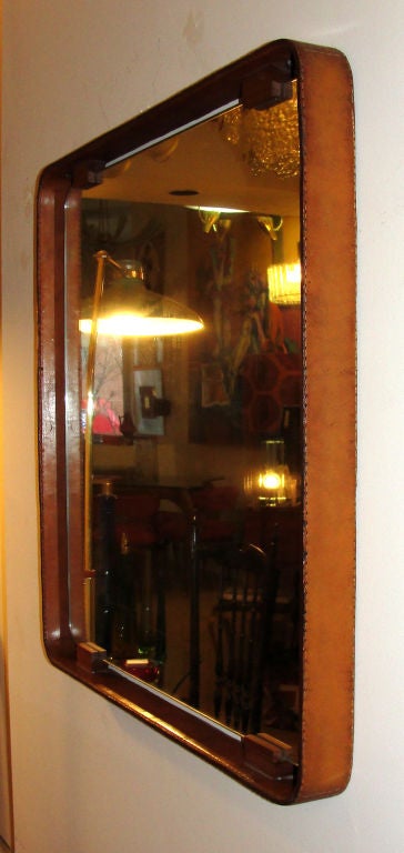 Leather mirror attributed to Adnet