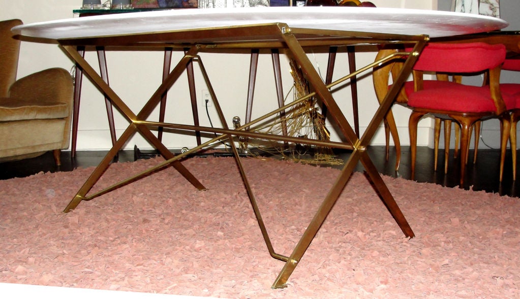 The prototype of this table dates back to the 30's but its official date is 1947 when Azucena the company created by Luigi Caccia Dominioni started its production. This particular table dates late 50's early 60's. Picture of it in its original