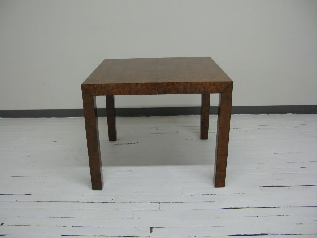 Lovely perfect size square dining table by Milo Baughman in burl wood veneer,with 2 extension leaves of 18