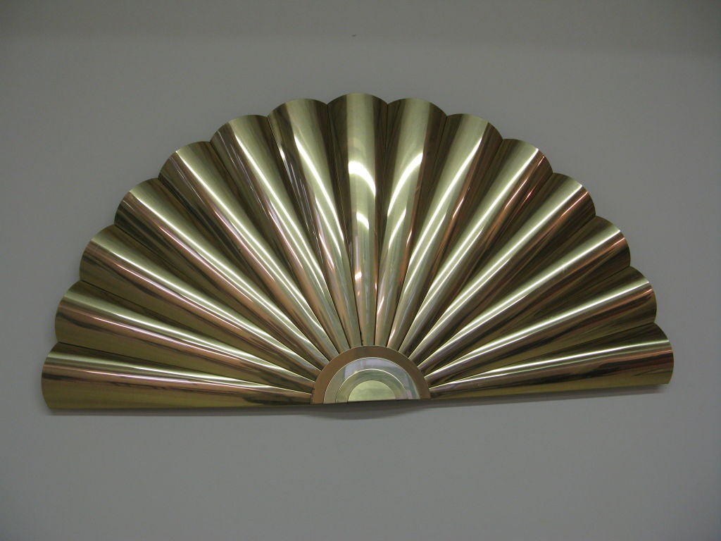 Large C. Jere brass wall hanging fan,signed and dated 1989.