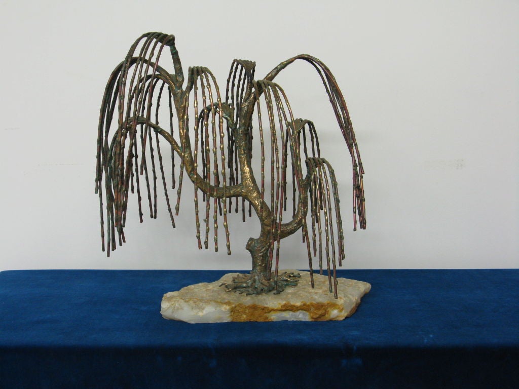 Very attractive weeping willow tree sculpture by Brian Bijan. Tree is made with mixed copper and brass metal and supported by a quartz stone base. Stamped 110-250 on trunk.
