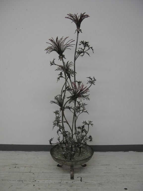 Exceptional looking hand-forged French metal sculptural plant with original paint remains in French Renaissance style.