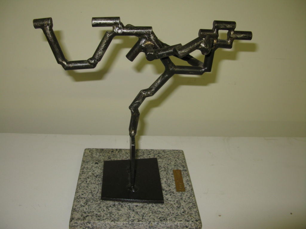 Abstract bronze metal sculpture with stone base signed by A.Y Chembers in the style of Boccioni.