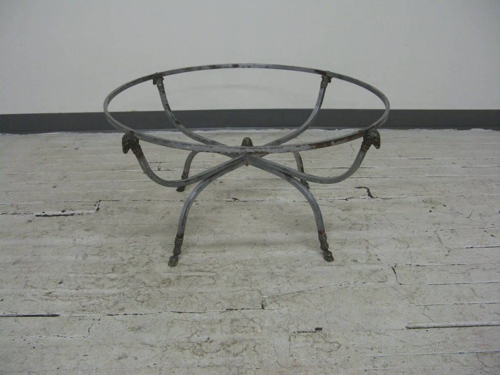Beautiful round nickel on iron and glass top coffee table,with acorn finial in manner of Jansen.